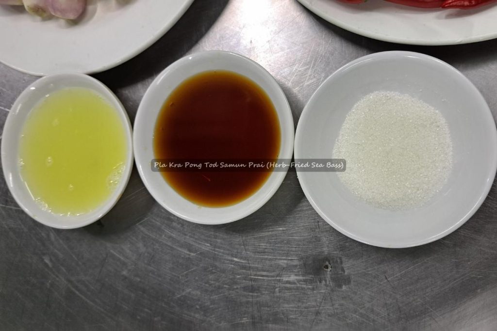 Pla Kra Pong Tod Samun Prai (Herb-Fried Sea Bass)