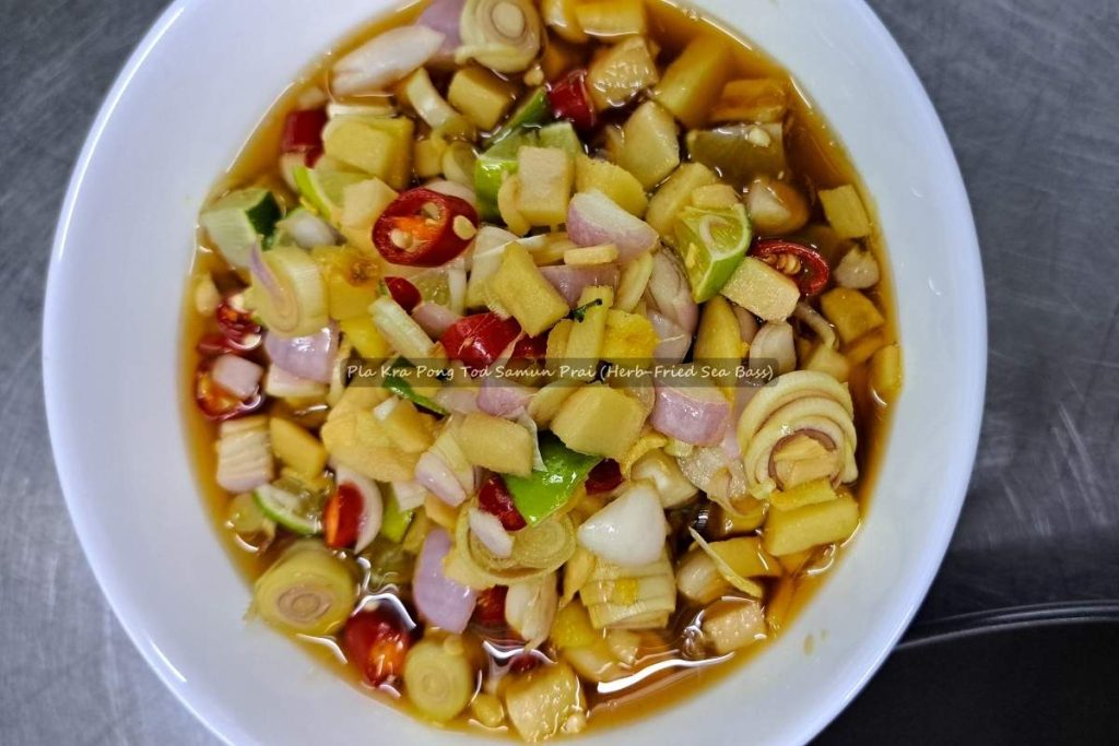 Pla Kra Pong Tod Samun Prai (Herb-Fried Sea Bass)